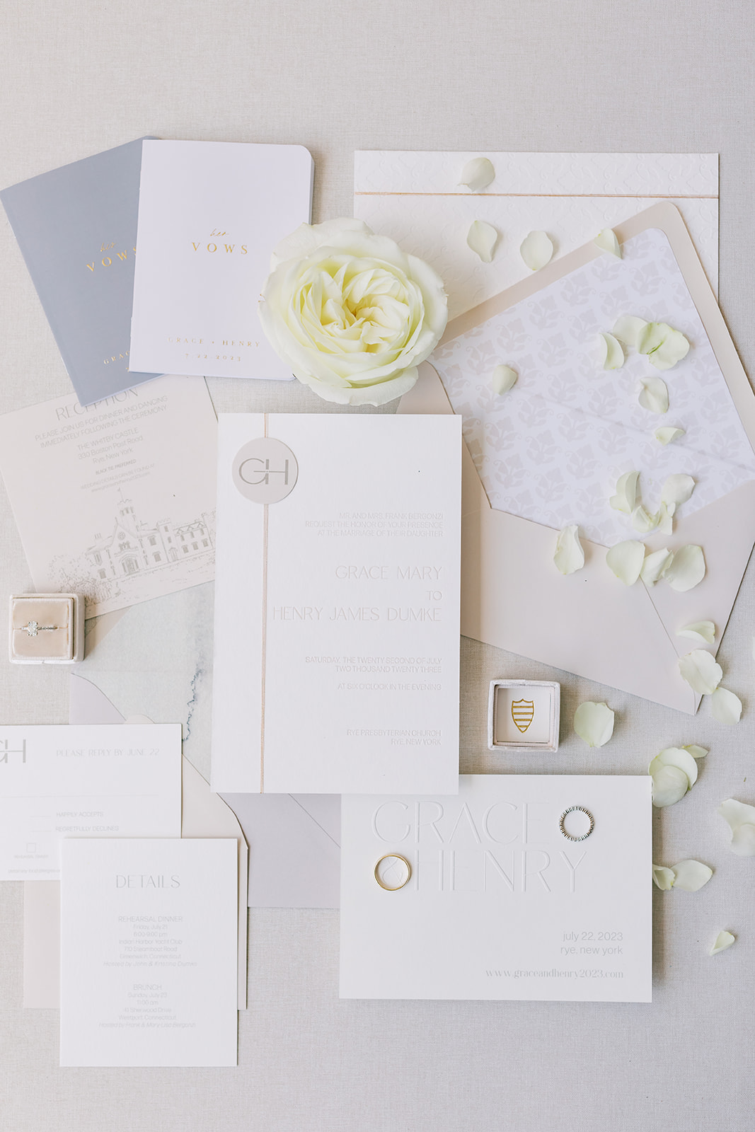 Wedding details with invitation suite with neutrals, champagne, and taupe tones