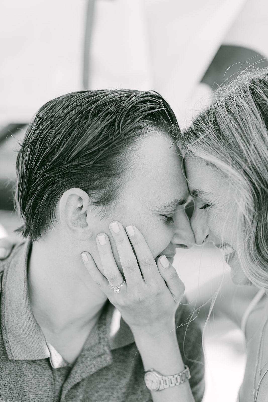 detail shot of engaged couple sharing a close moment