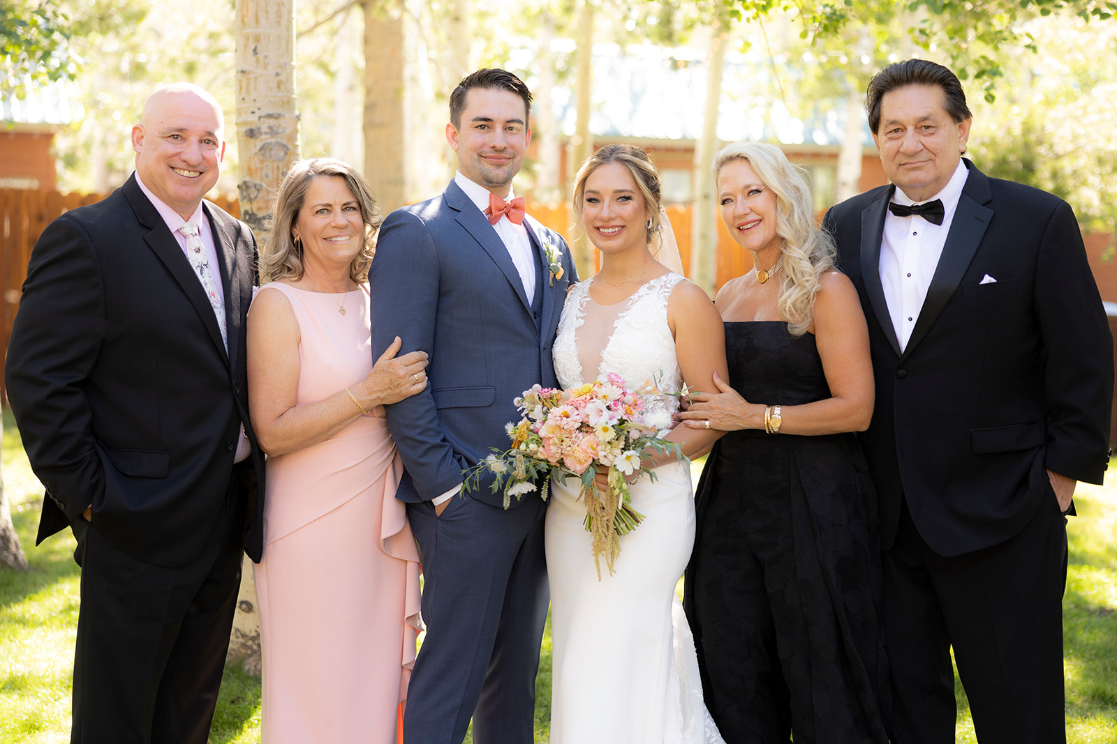 immediate family with bride and groom for family portraits