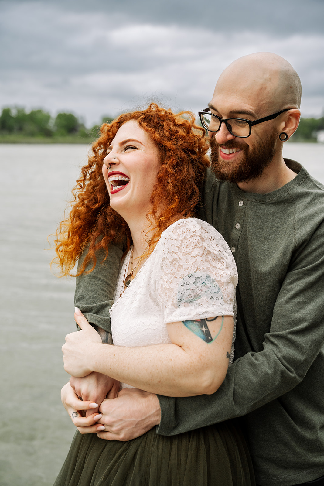 Fun moment between engaged couple during photoshoot near Milwaukee Wisconsin