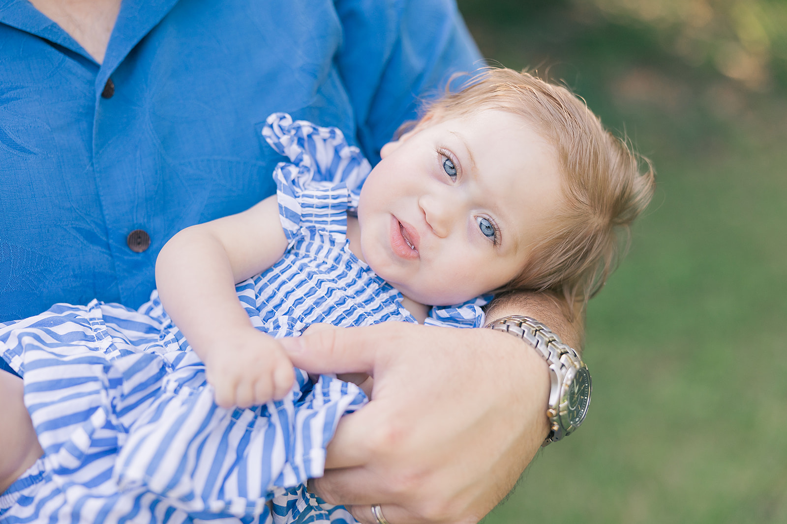 12 Month Photos of a Baby Girl with Bright Blue Eyes