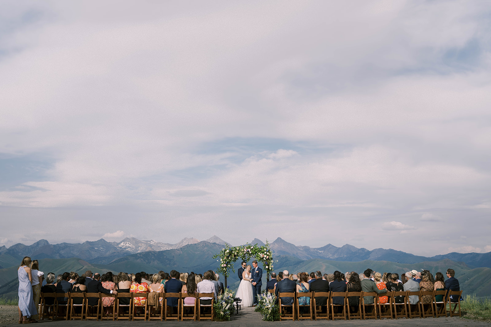 Wide shot of wedding ceremony near The Roundhouse at Sun Valley Resort, Idaho
