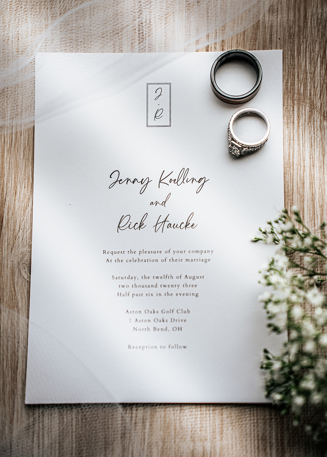 Artistic shot of wedding invitation with directional light