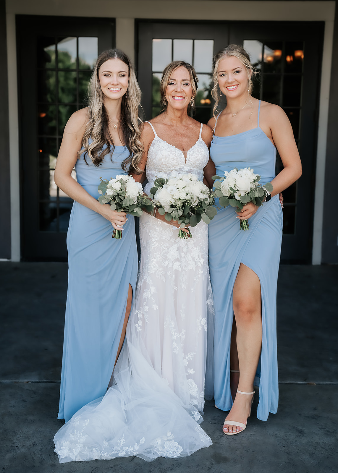 Bride with daughters at Aston Oaks Golf Club