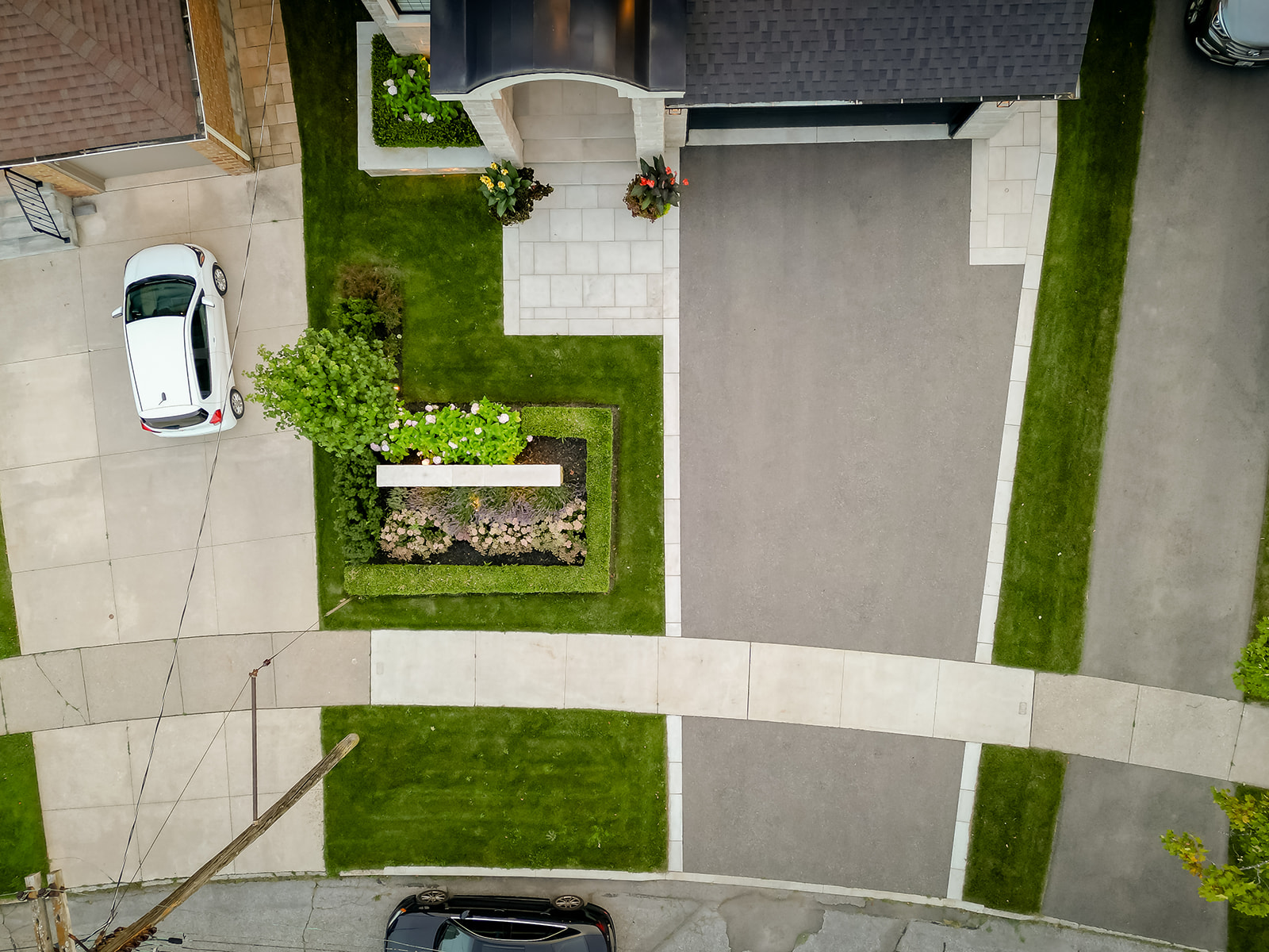 Top-down view of the driveway in front of the house.