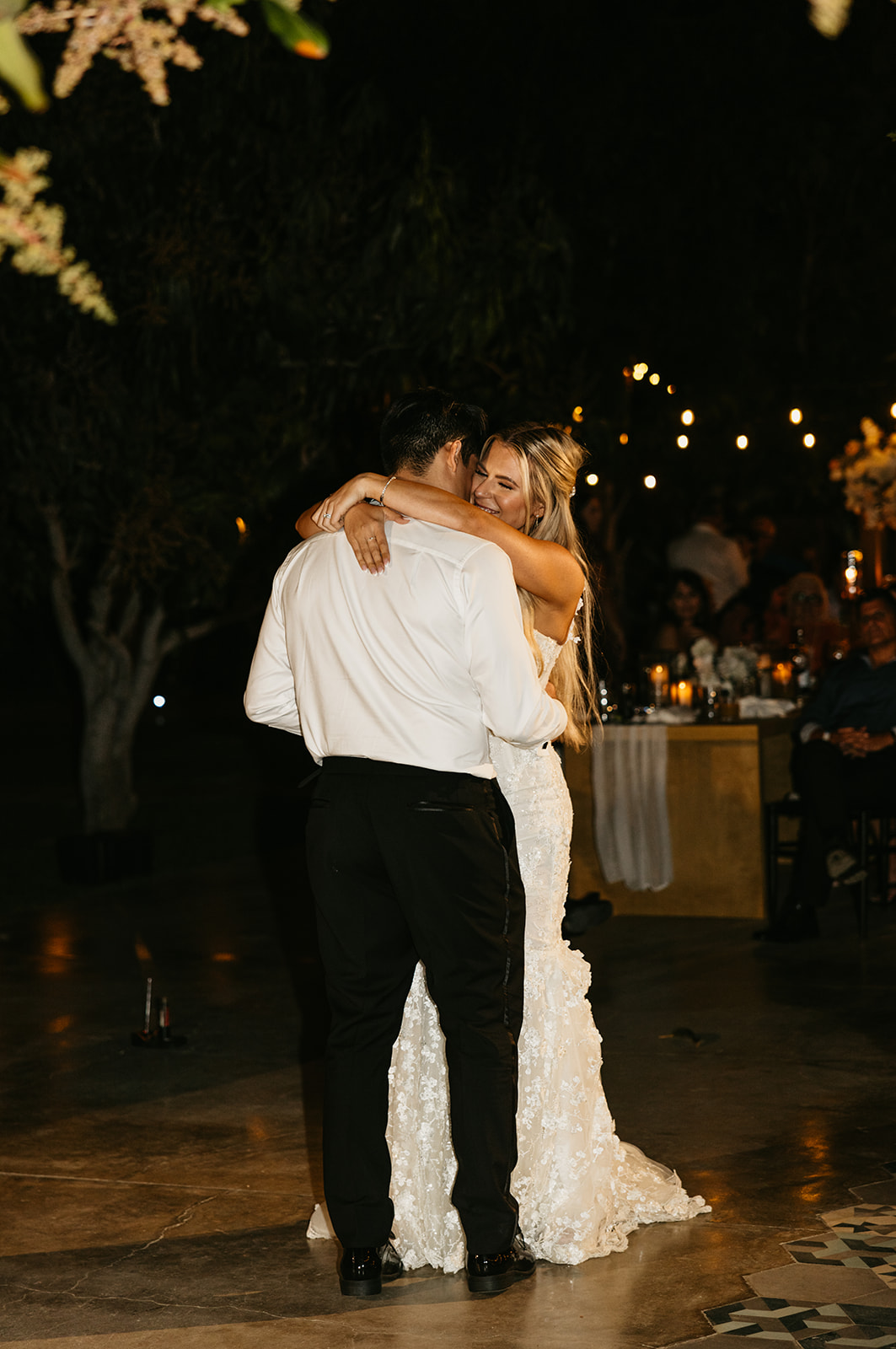 Bride and groom's first dance at their reception at Acre Resort Cabo