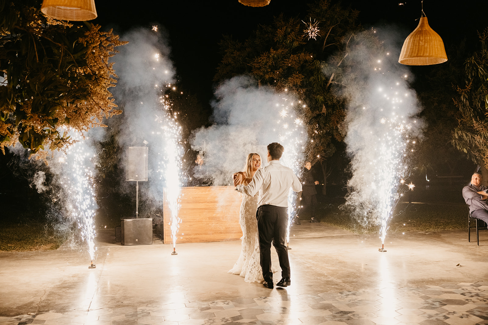 Bride and groom's sparkler first dance at their reception at Acre Resort Cabo 