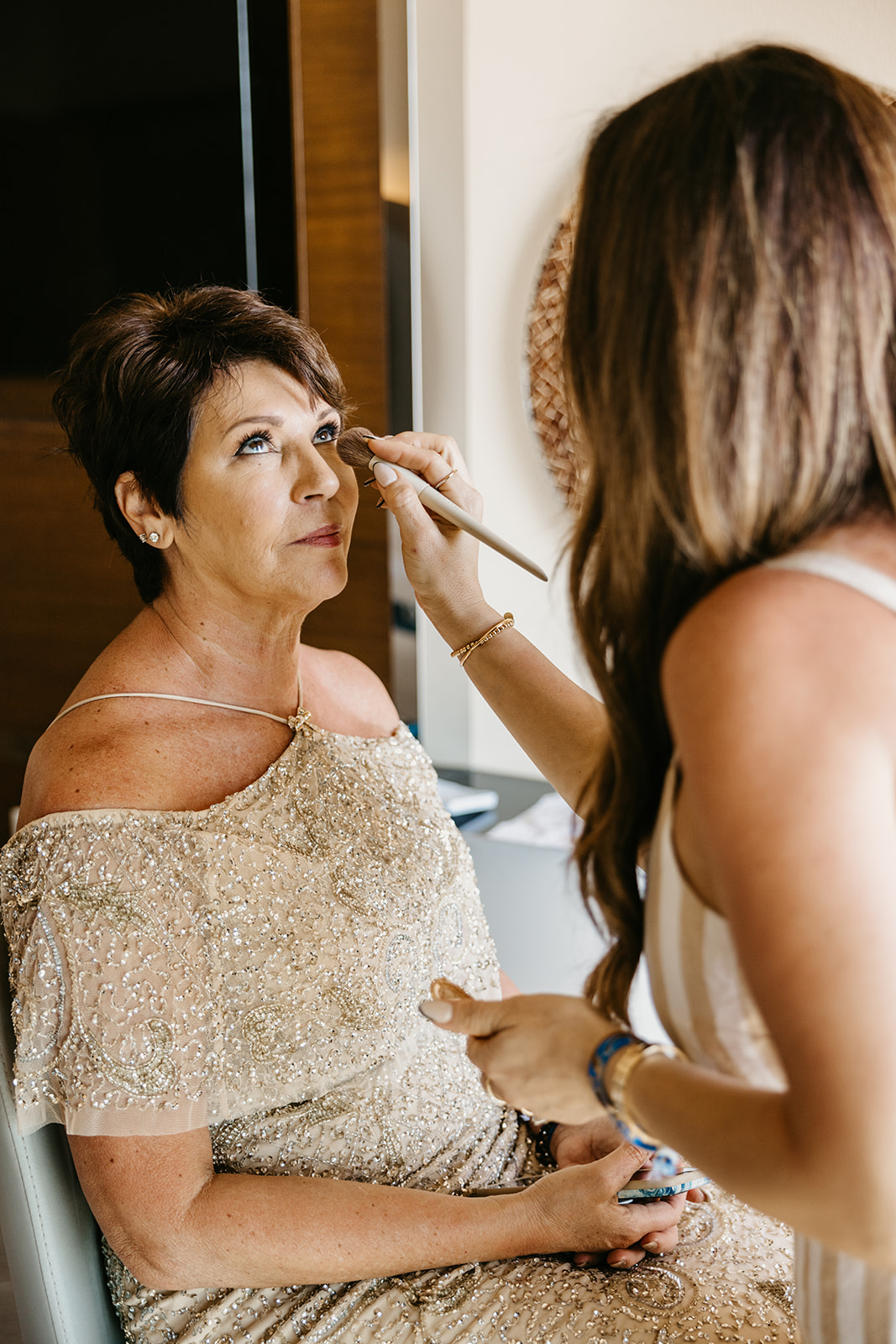 Mother of the bride getting make up done at villa la valencia in cabo san lucas mexico