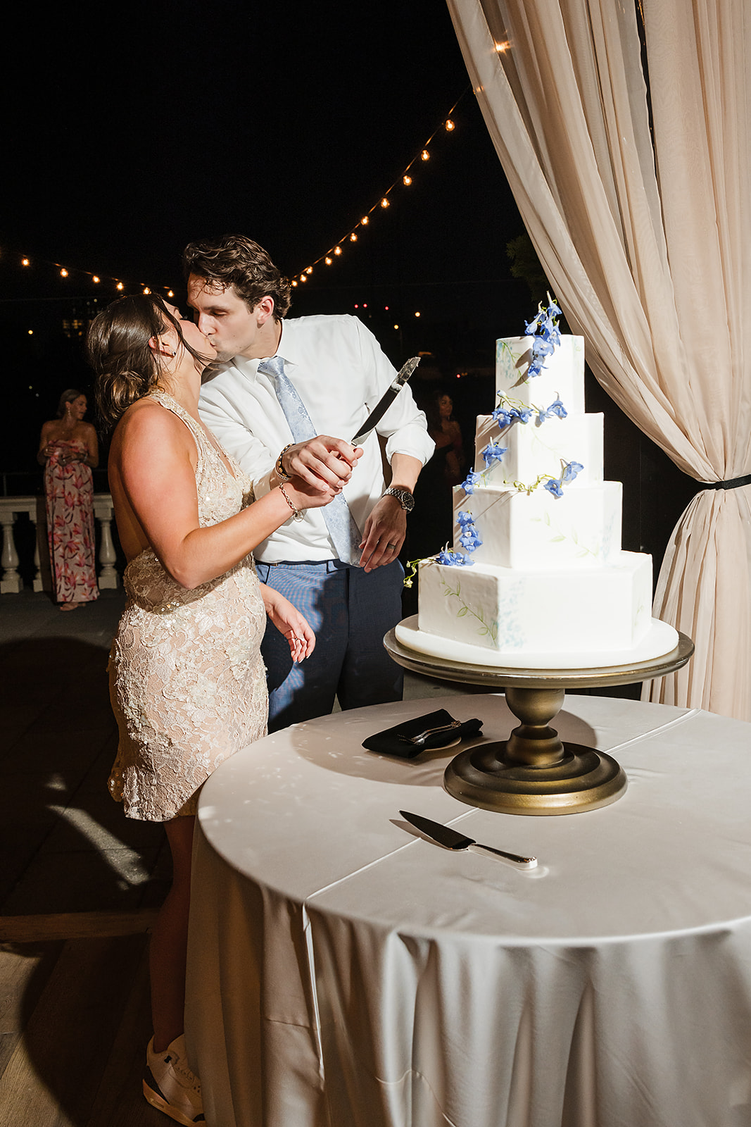 bride and groom cutting the cake at Water Works wedding
