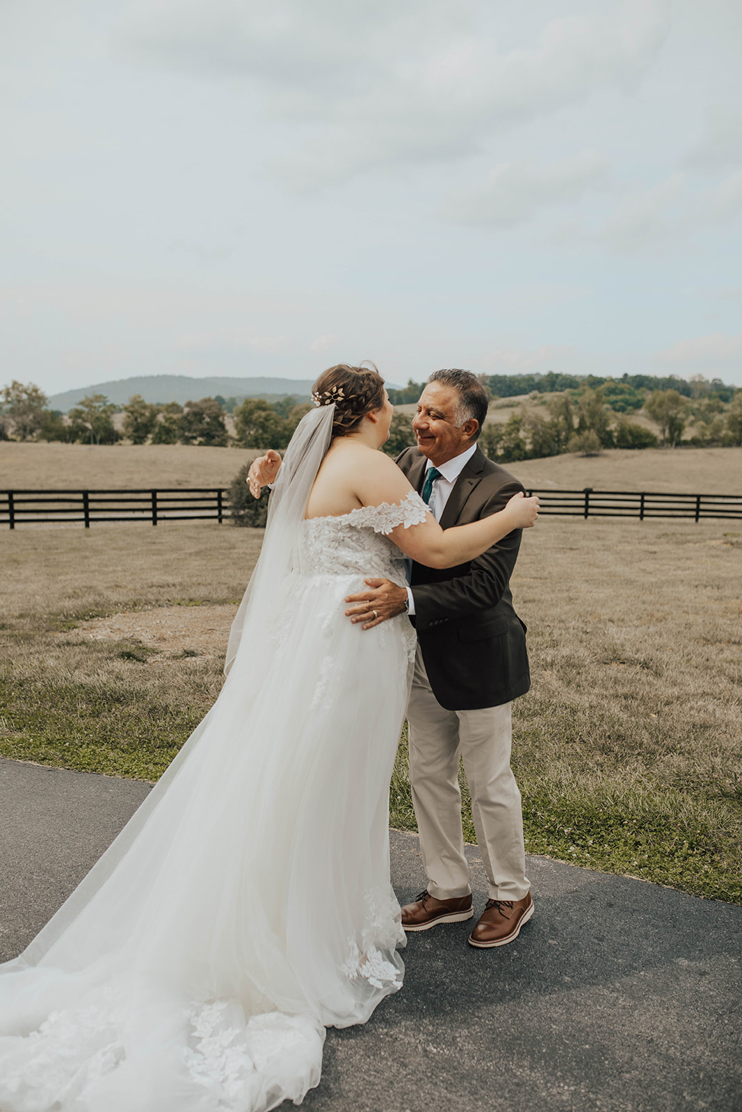 bride and dad hug 