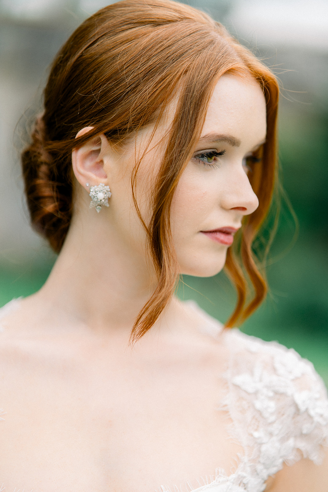 Bride's flawless look completed with hair and makeup by Victoria Nightingale and Tara Sanger, in the Castle's luxurious 