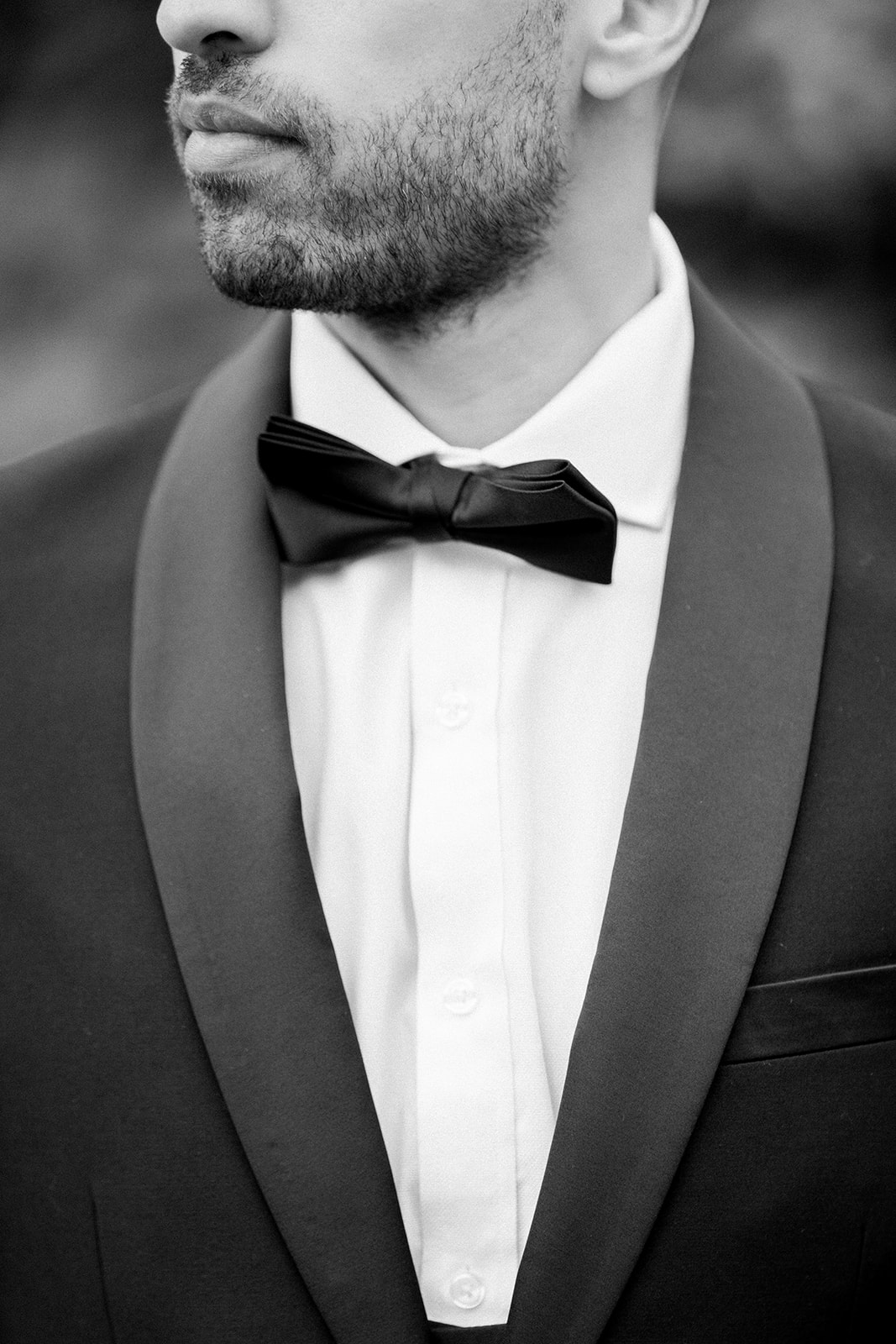 Classic and sophisticated groom's look, complete with a Paul Andrew tailored suit and a crisp white shirt.