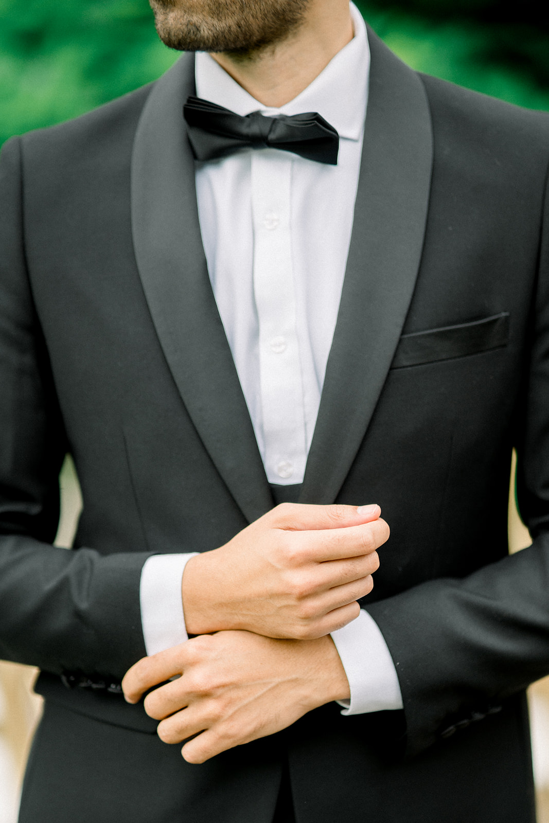 Classic and sophisticated groom's look, complete with a Paul Andrew tailored suit and a crisp white shirt.