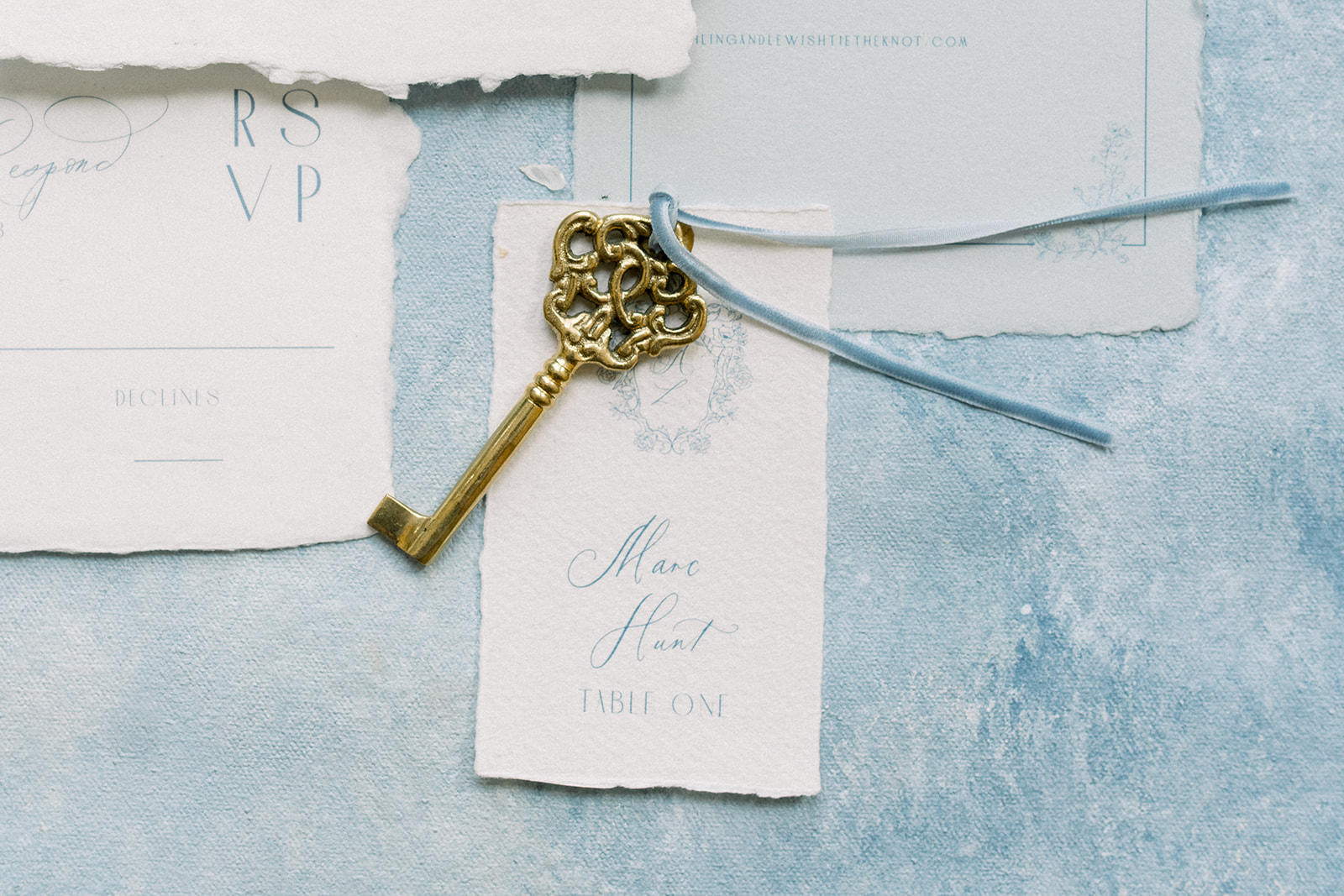 Elegant flat lay of wedding accessories with a destination wedding theme, featuring elements from Ireland's local artisa