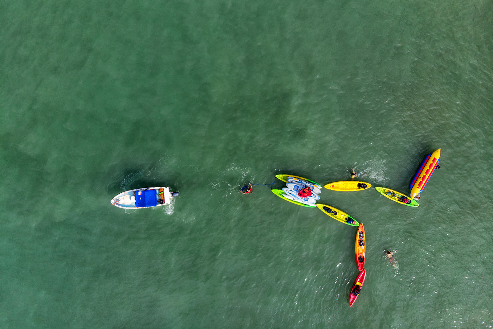 Drone shot of kayaks and boats