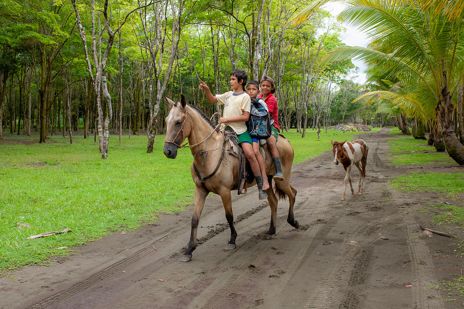 Kids on a horse at Playa Linda Costa Rica