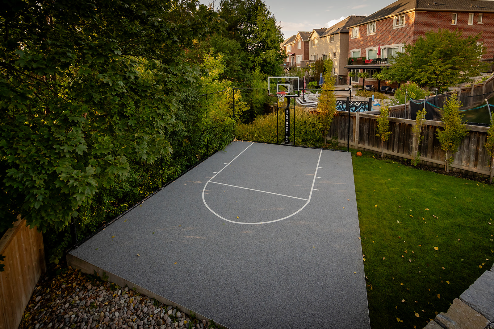 A practice basketball court with one net.