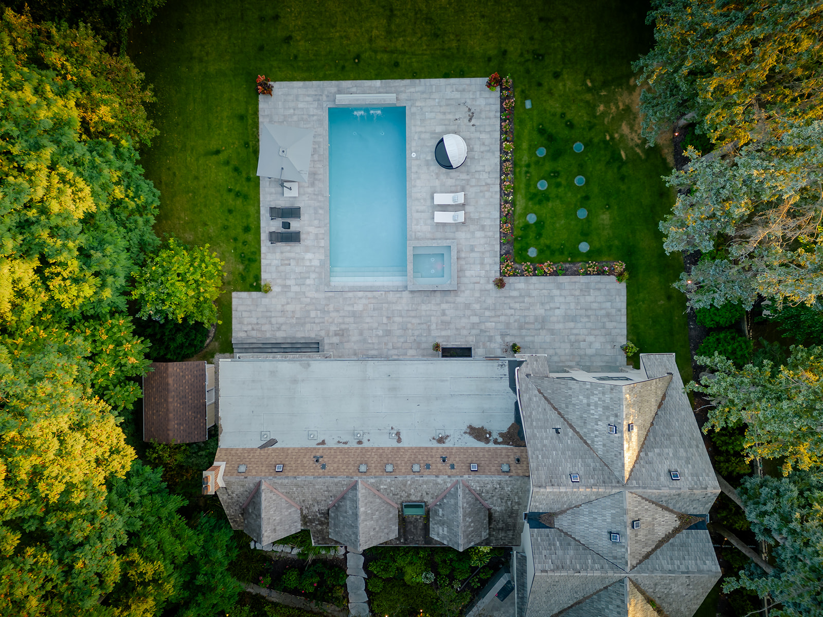 A top-down view of the backyard with the inground pool.