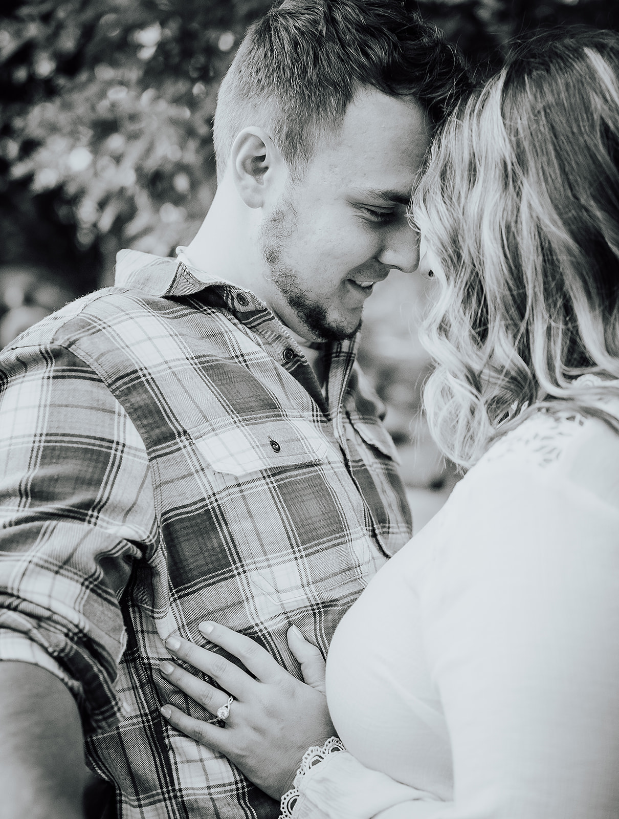 Black and white photo of couple cuddling Cox Arboretum Dayton Ohio