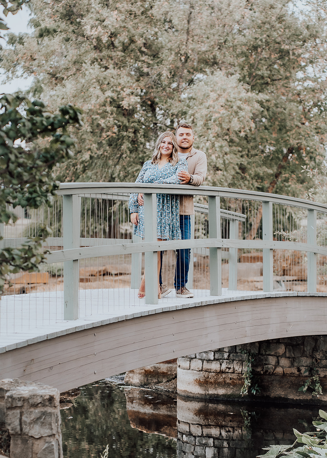 Couple on bridge engagement photography Cox Arboretum Dayton Ohio