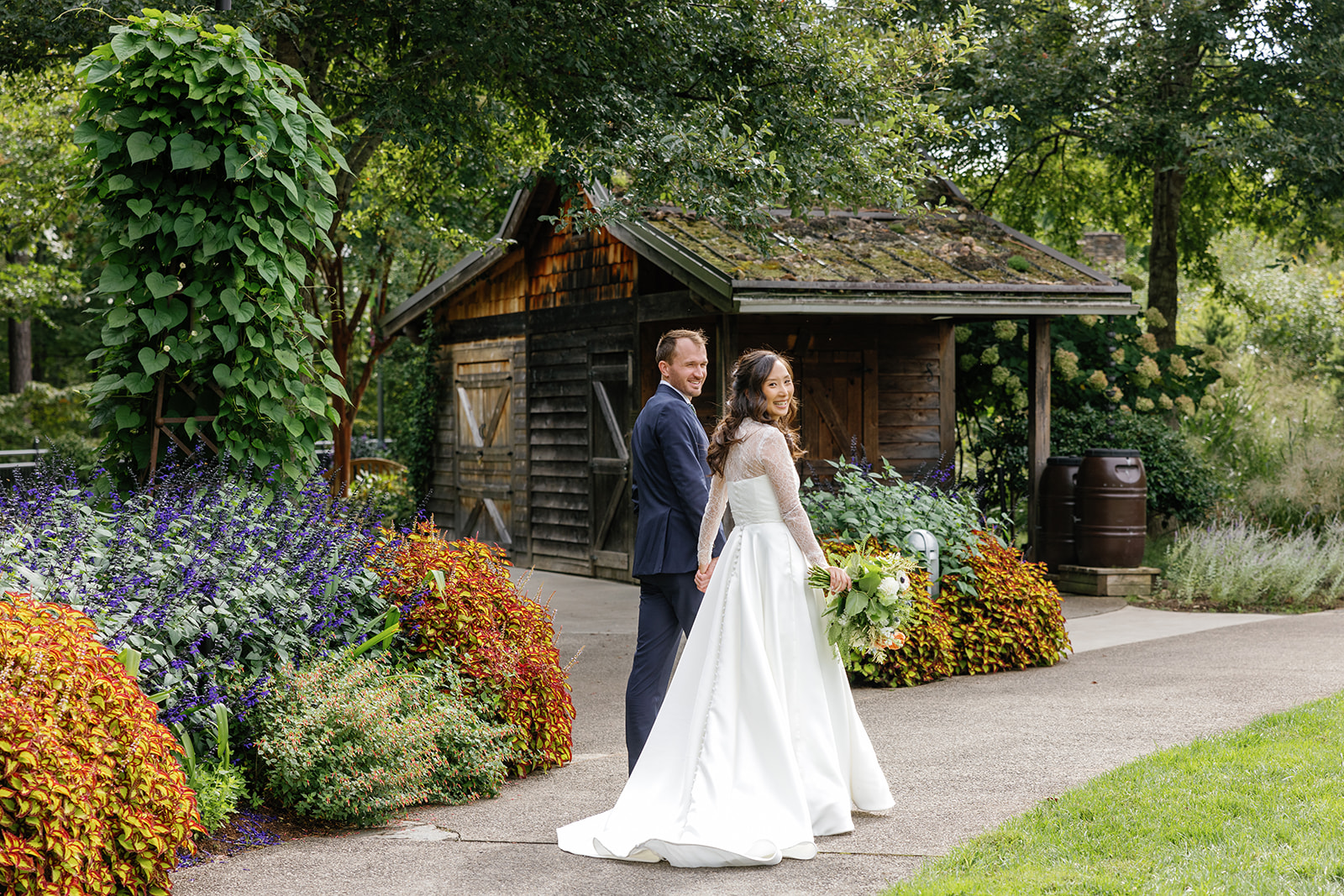 Bridea and groom at garden wedding at the NC arboretum 