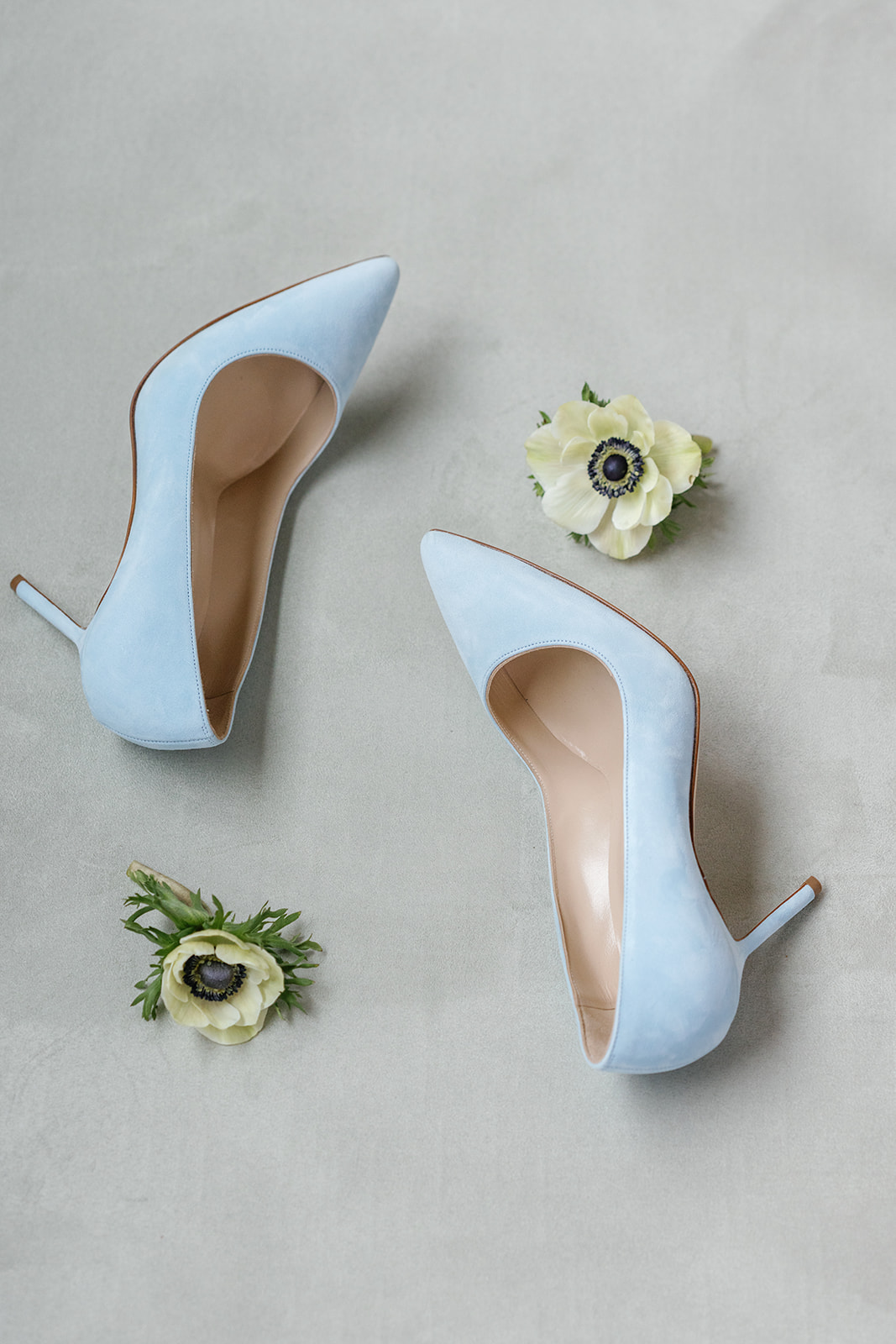 brides baby blue Manolo Blahnik shoes for something blue at wedding 