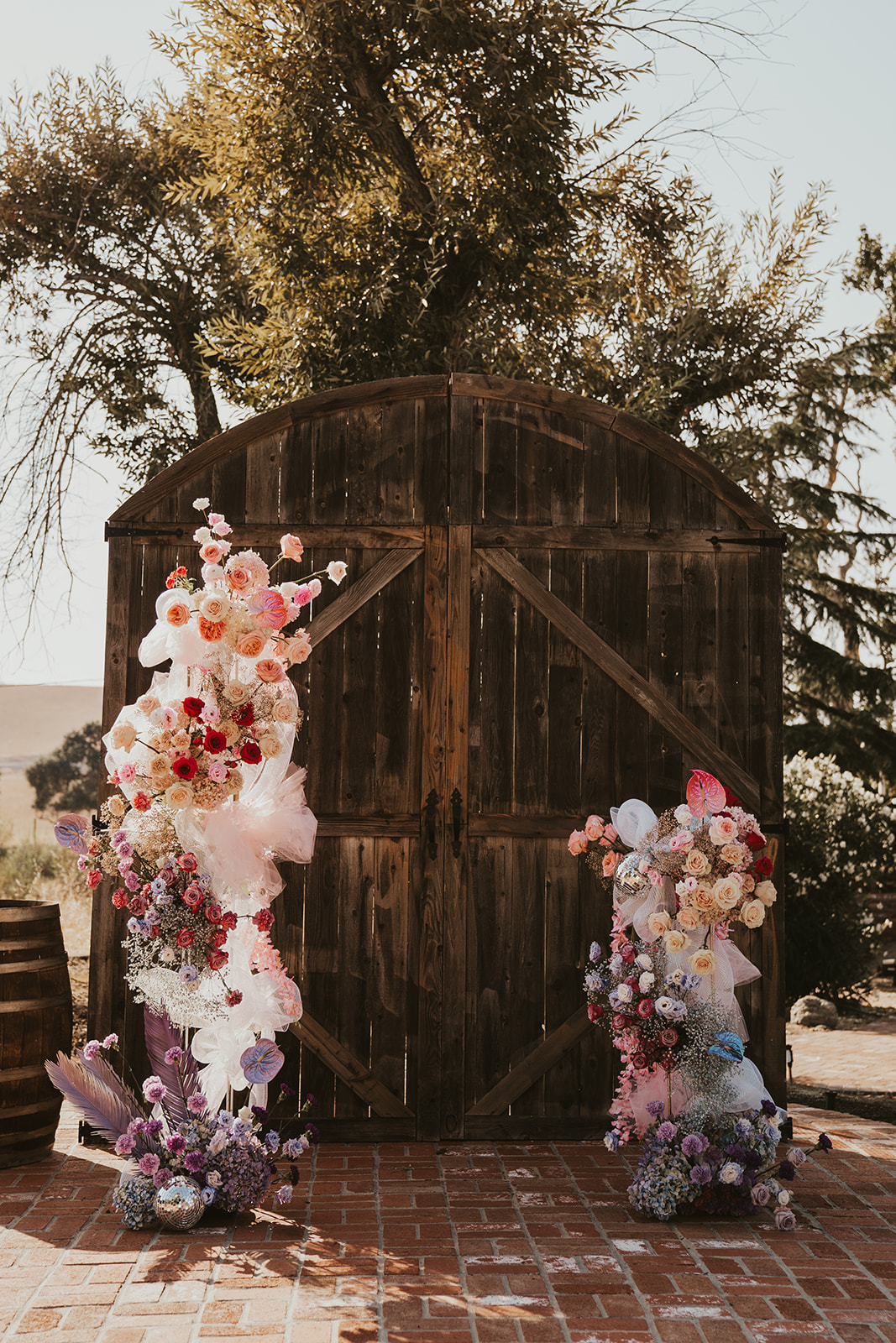 Floral arrangements at wedding altar in Livermore, California wine country