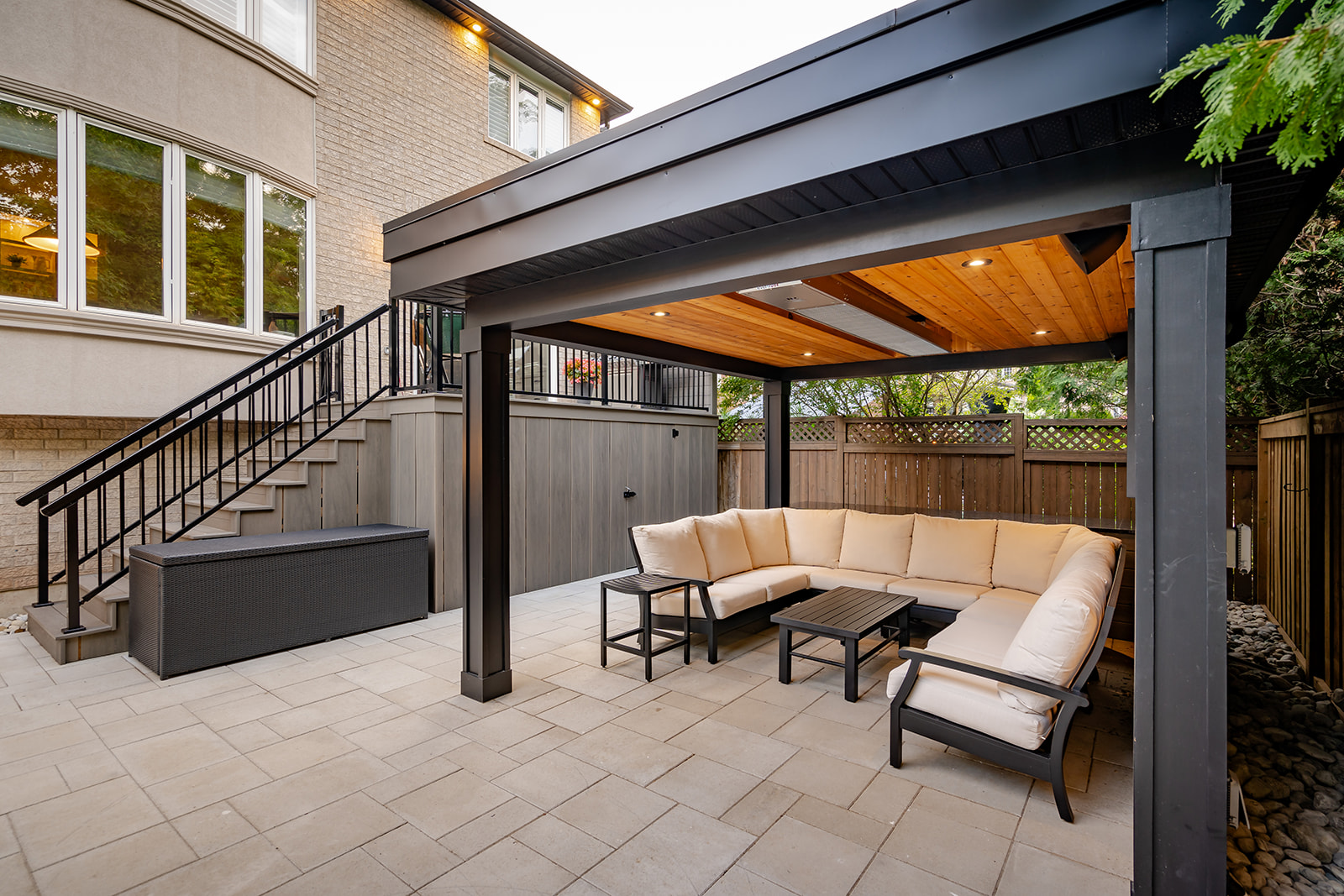 An outdoor seating area underneath a gazebo.