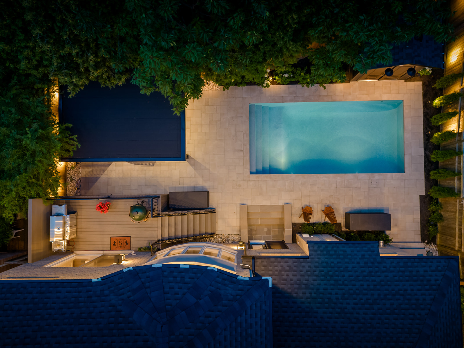 Top-down view of the backyard with the inground pool.