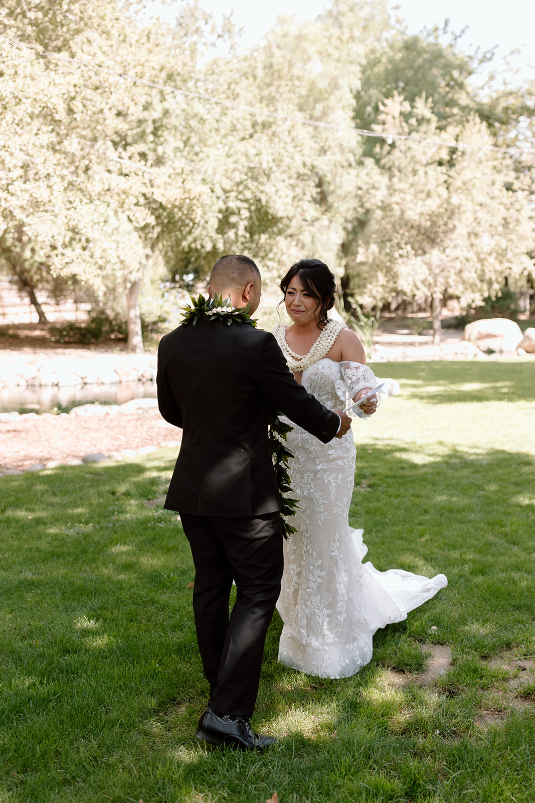 candid image of wedding couple on wedding day at galway downs temecula california