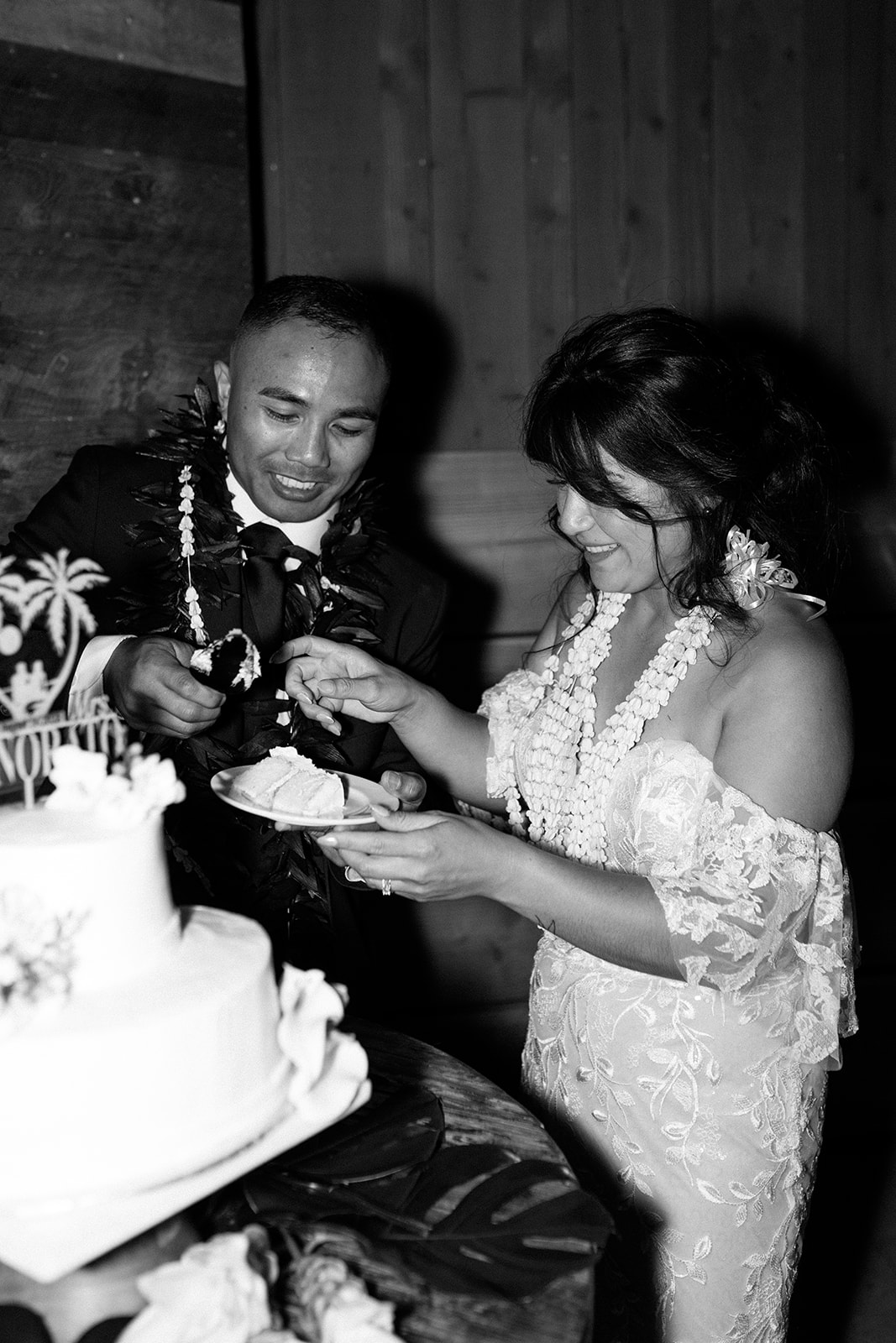 cake cutting candid image of wedding couple on wedding day at galway downs temecula california