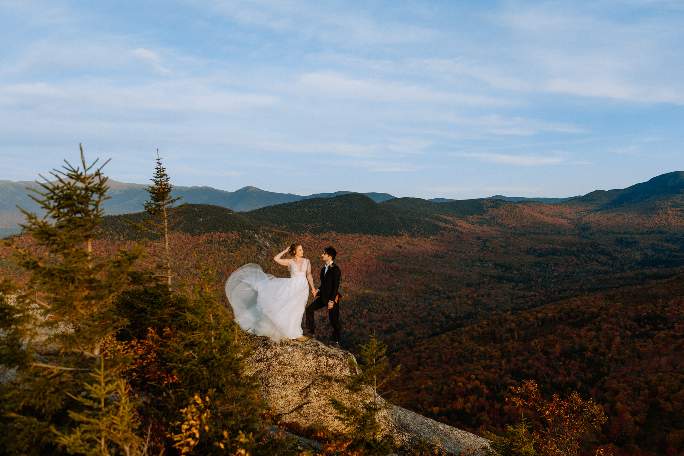 A couple who eloped in the White Mountains say their vows in front of Mount Washington