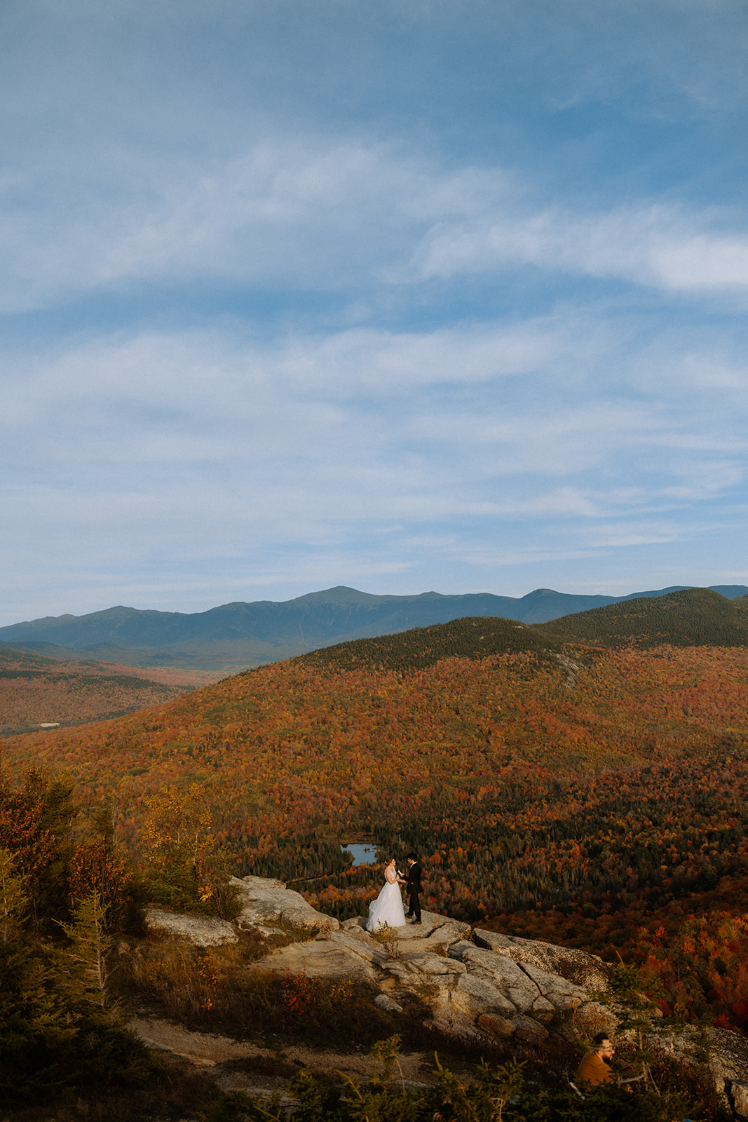 A couple who eloped in the White Mountains say their vows in front of Mount Washington