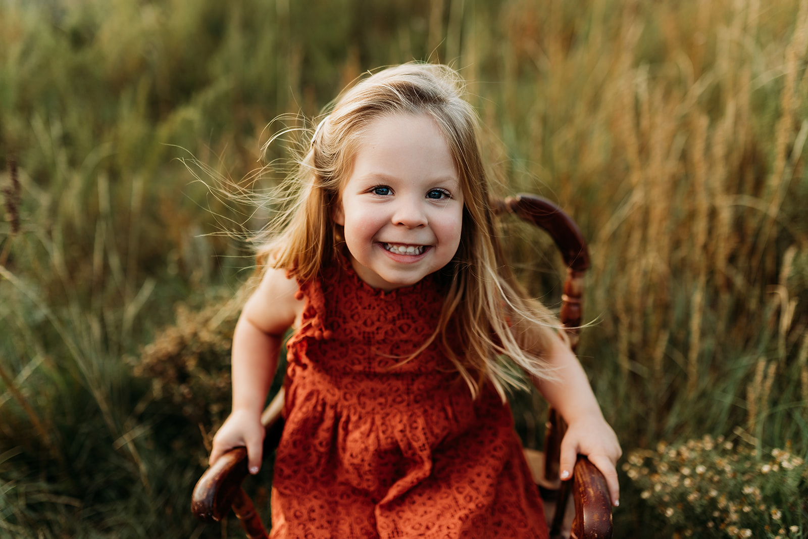 Photographer from Heather Ann Photography captures adorable girls' smile