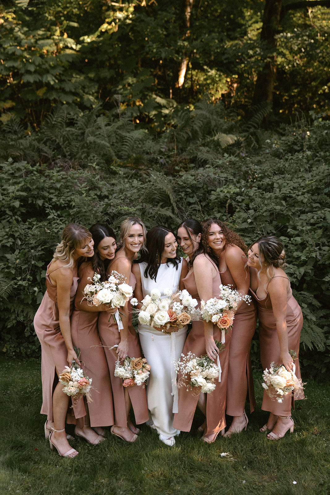 Blush bridesmaids dresses and a modern square neck wedding dress for a fall wedding at Bridal Veil Lakes
