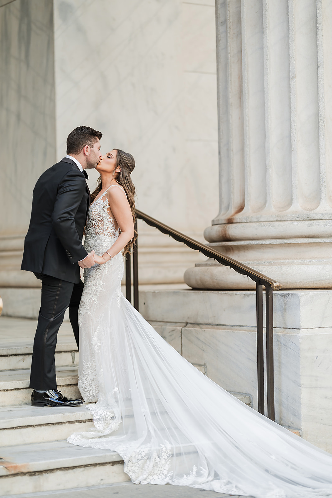 Bride and Groom effortless candid portrait on the steps of Ritz Carlton Hotel in Philadelphia