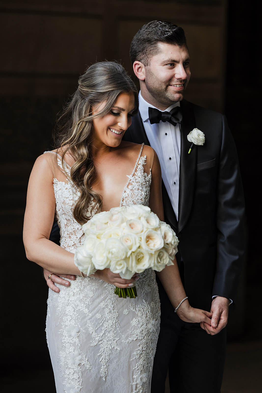 Philadelphia luxury wedding photo of the bride and groom effortlessly posing at Crystal Tea Room