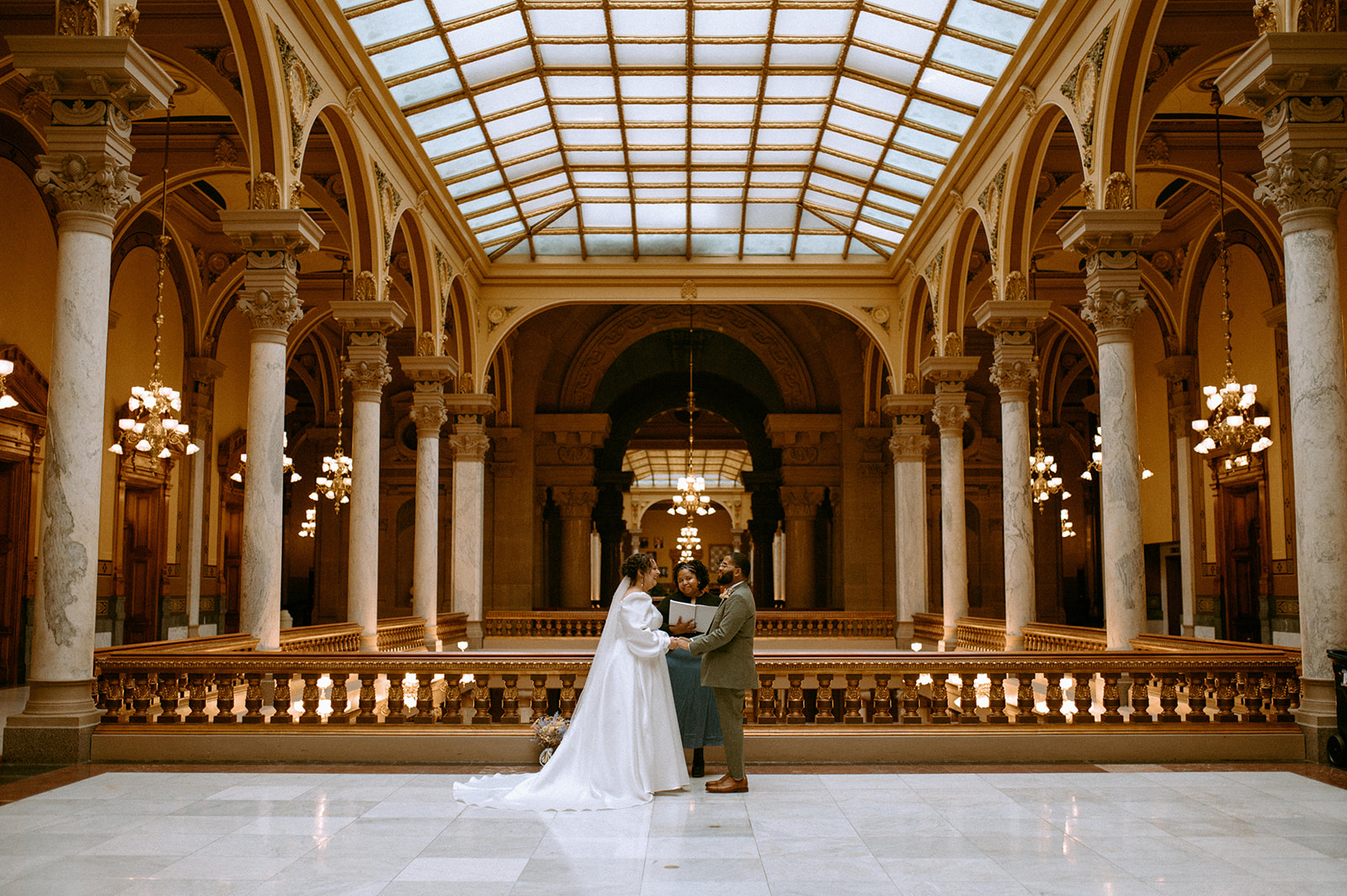 Bride and Groom saying their vows while getting married inside the Indianapolis State House
