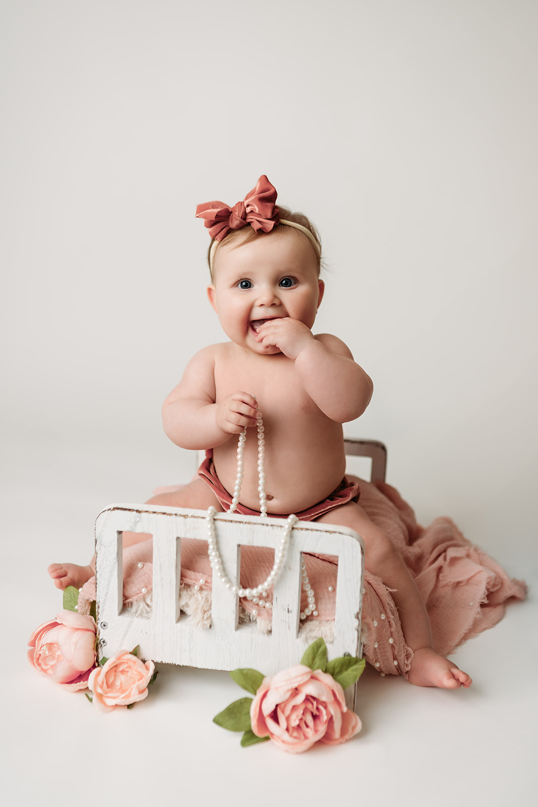 6 month old girl has pictures taken in a simple setup by Heather Ann Photography