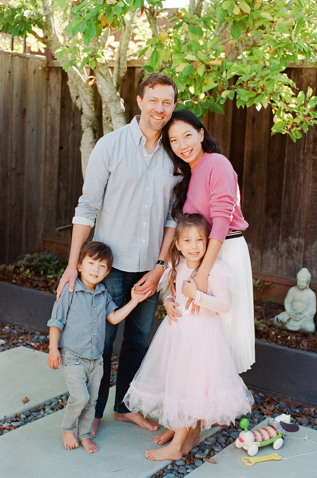 A young family plays in their chic Eichler home in San Mateo