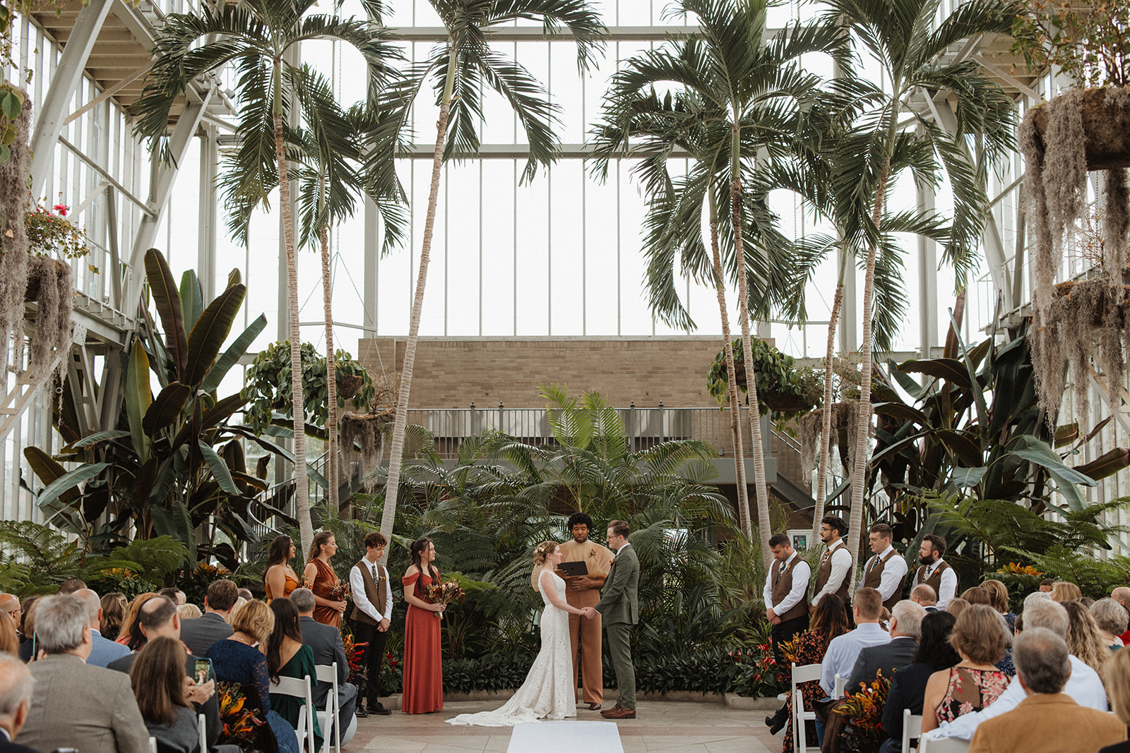 Couple holding ceremony at Forest Park Jewel Box wedding