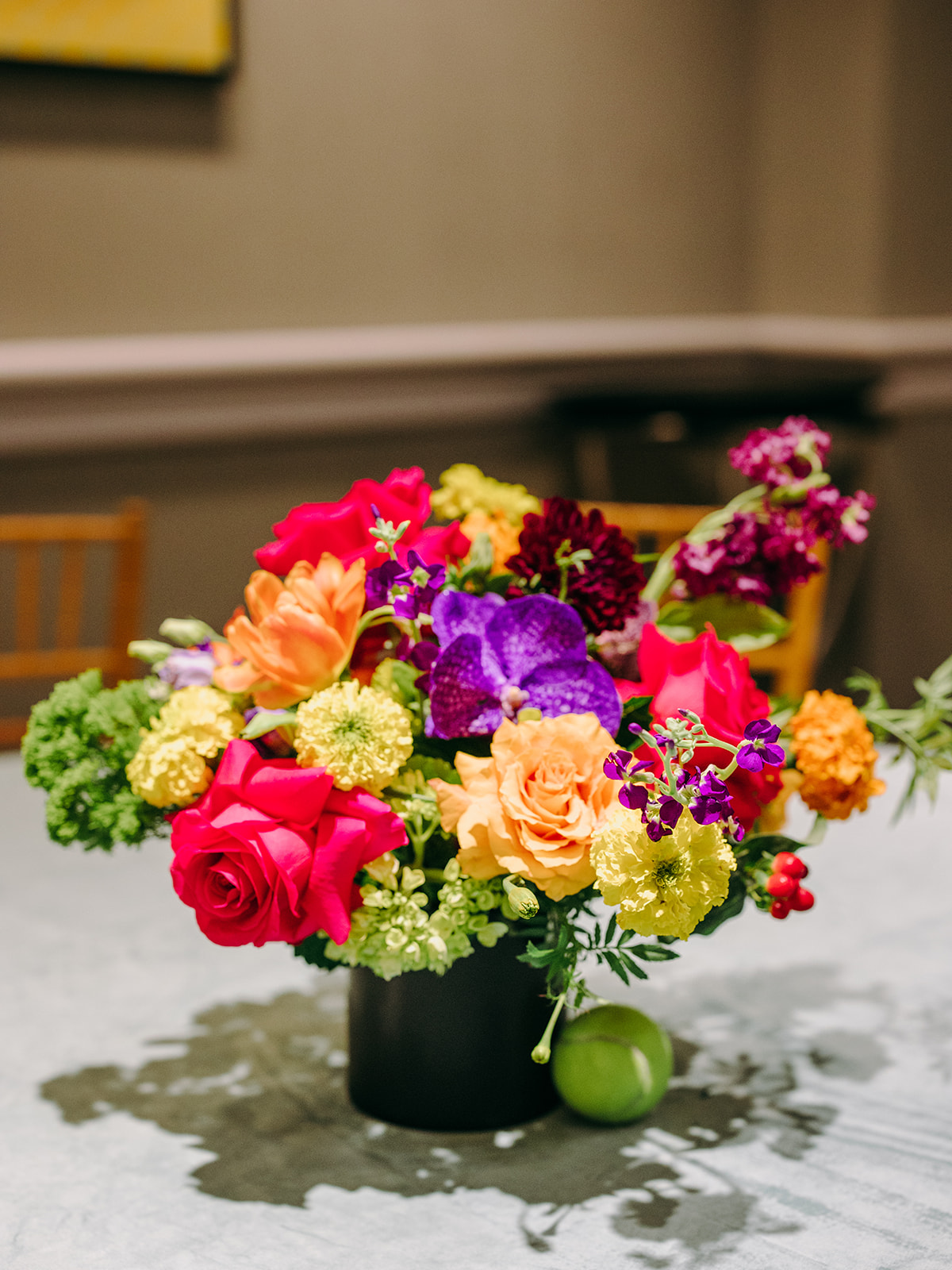 colorful centerpiece with tennis ball