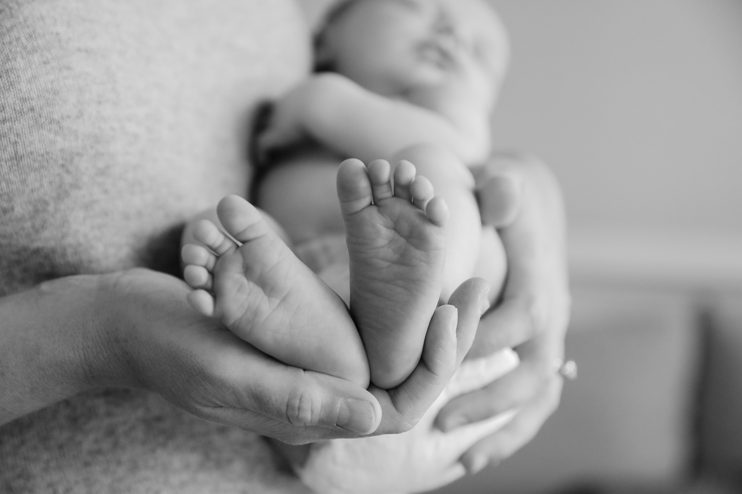 newborn feet black and white photo 