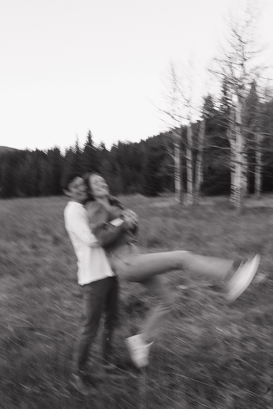Blurry and documentary style engagement photos in Colorado's Rocky Mountain's