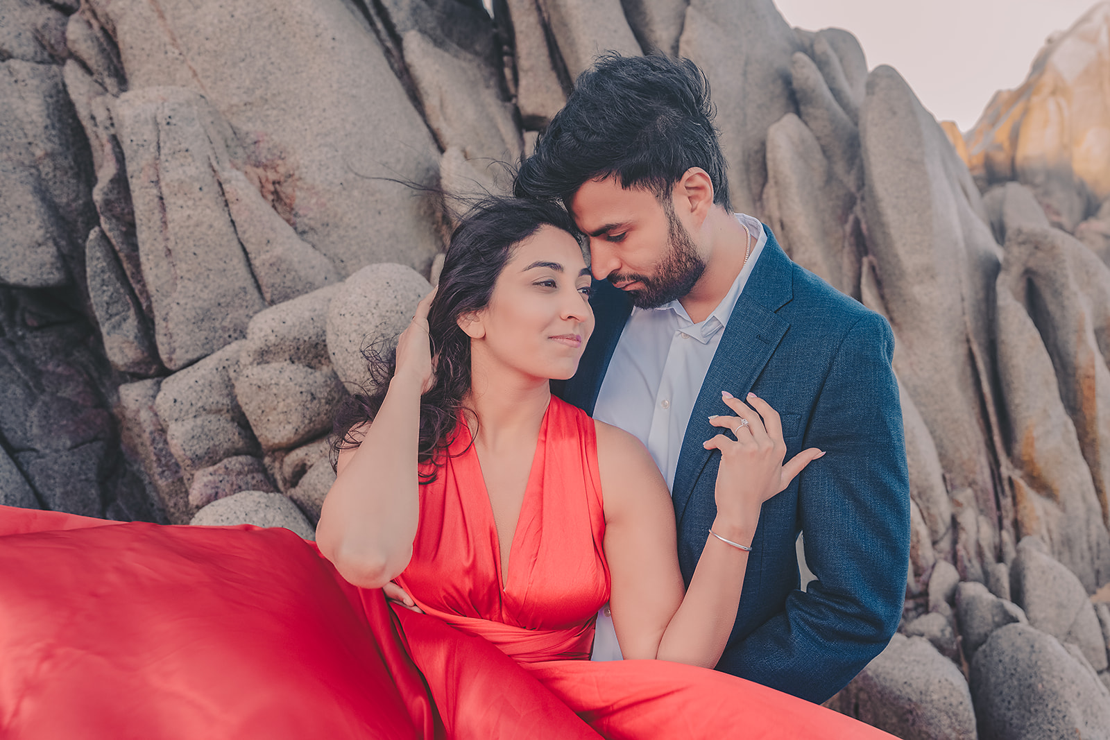 Los Cabos beach engagement photo shoot in red dress