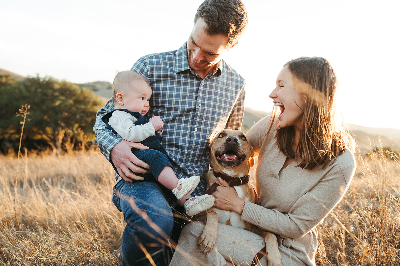 Family photo with baby and dog at Helen Putnam Park in Petaluma by Sunshine Lady Photography
