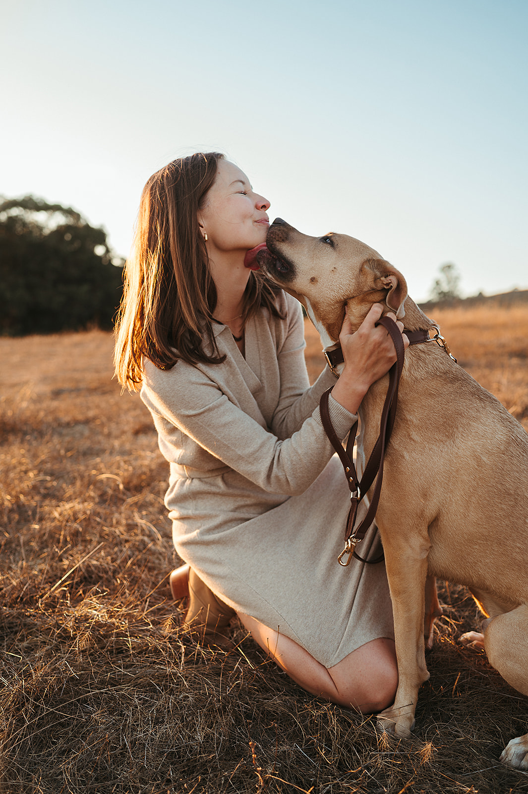 Women hugging her dog during family photos at Helen Putnam by Sunshine Lady Photography