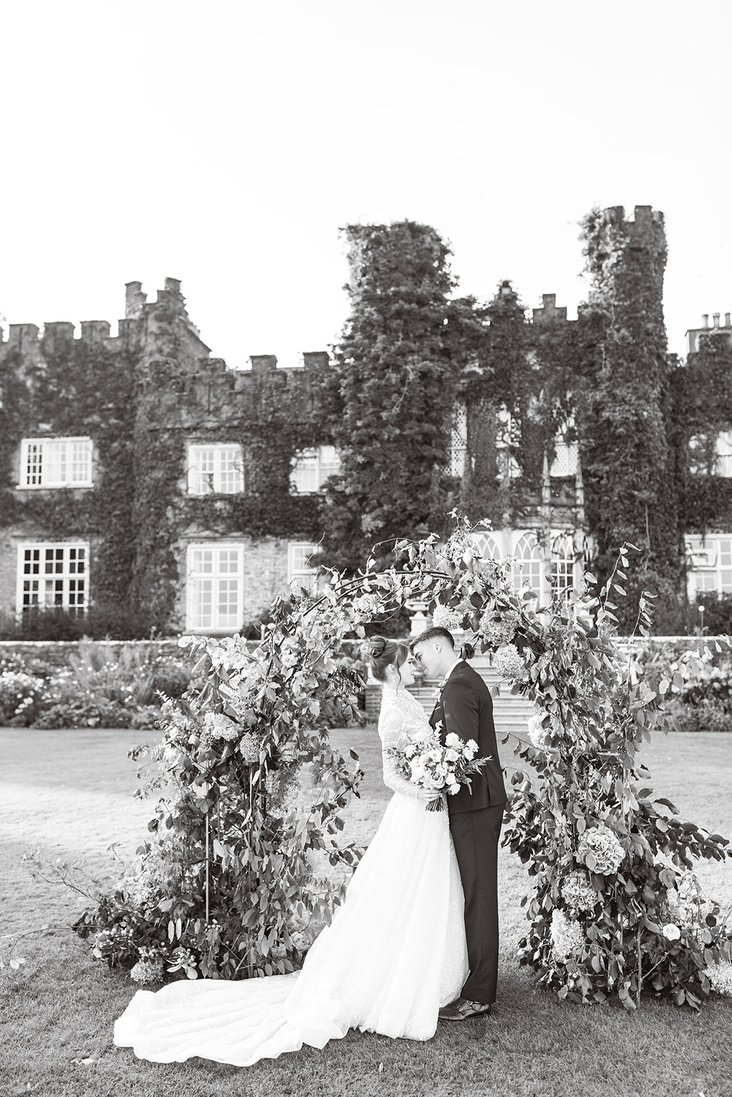 couple's wedding portraits on the grounds of luttrellstown castle in dublin ireland