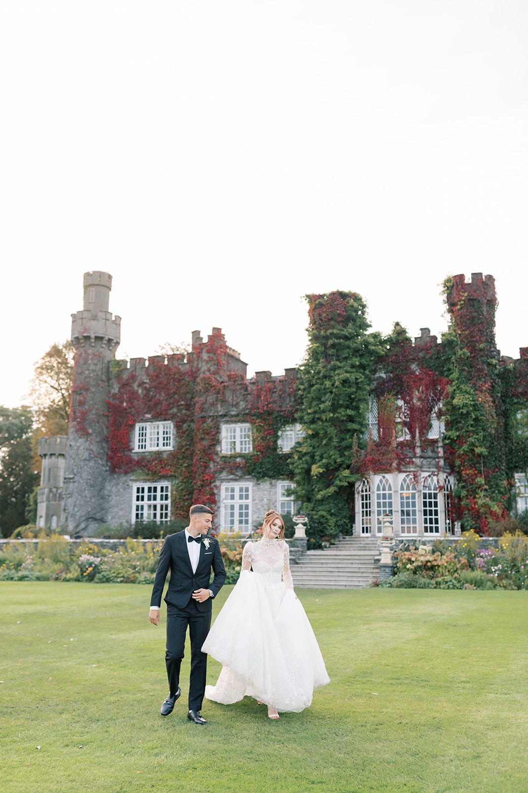 couple's wedding portraits on the grounds of luttrellstown castle in dublin ireland
