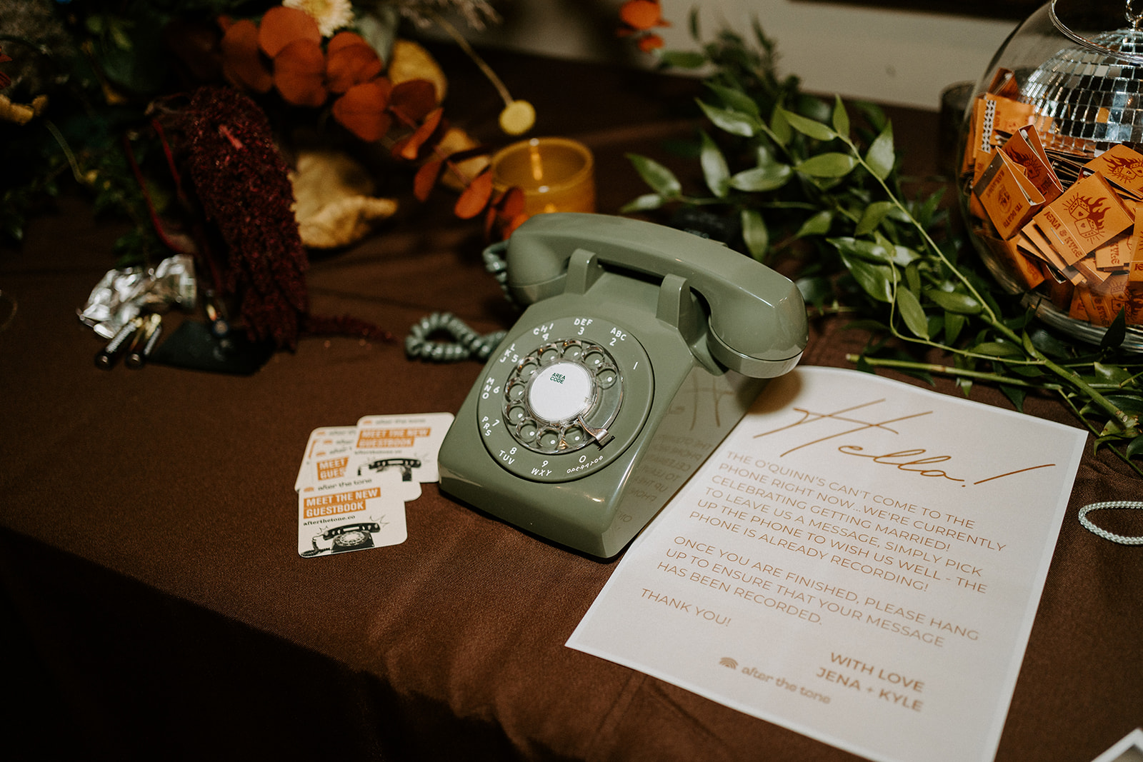 A rotary phone on the table.